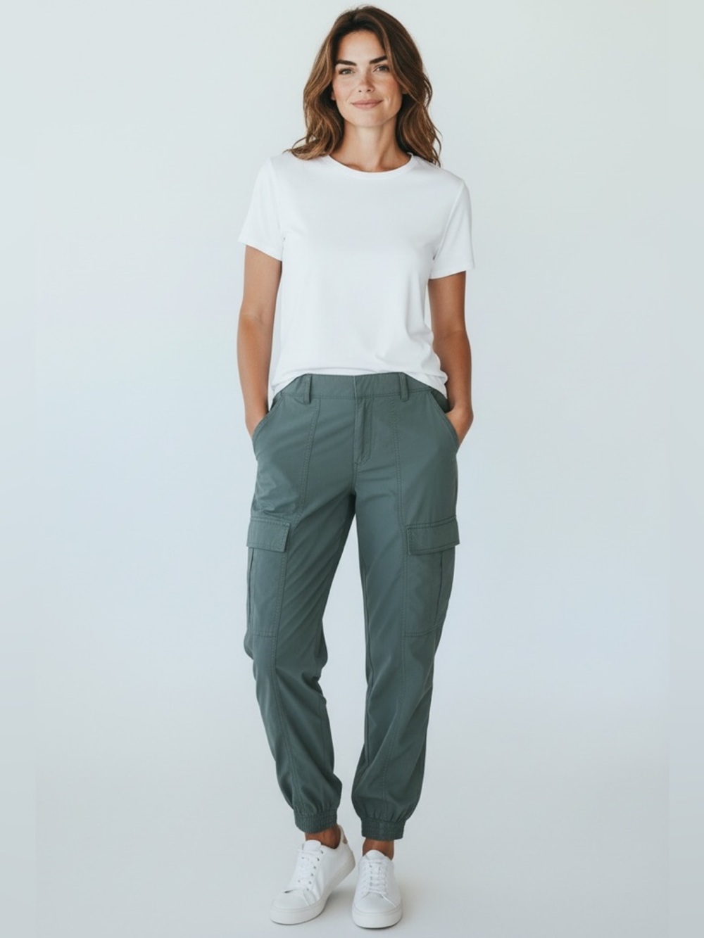 Athleta pant 4P NWOT Never worn. Greenish color. water resistant.